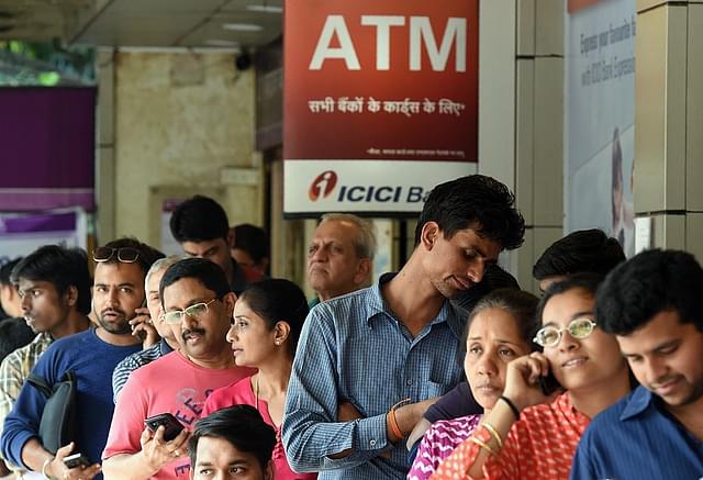 An ATM queue (PUNIT PARANJPE/AFP/Getty Images)
