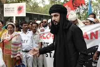 Mazdak Dilshad Baloch (C), son of prominent author-activist Naela Qadri Baloch and filmmaker Mir Ghulam Mustafa Raisaini, takes part in a protest against Pakistan’s ongoing human right violation in Balochistan. (PRAKASH SINGH/AFP/Getty Images)