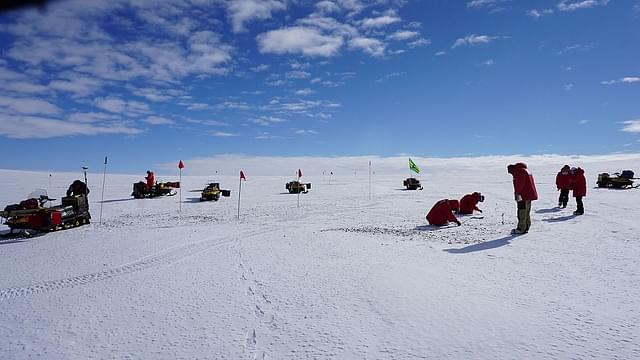 The ANSMET team searches for meteorites on the blue ice field in the Miller Range. (NASA/Cindy Evans)