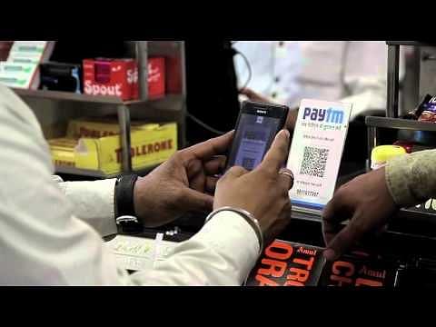 A customer scanning a Paytm QR code at a shop. Image credits: Paytm