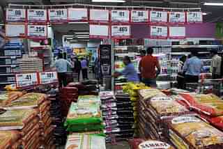 
Indian shoppers browse at a 
supermarket in Mumbai. Photo credit: INDRANIL MUKHERJEE/AFP/GettyImages

