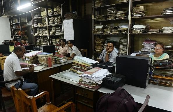 Employees at a government
office in Kolkata (DIBYANGSHU SARKAR/AFP/Getty Images)
