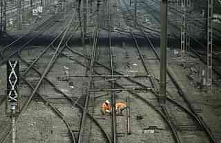 Railway
workers do a routine track inspection in Mumbai. Photo credit: PUNIT
PARANJPE/AFP/GettyImages.




&nbsp;
