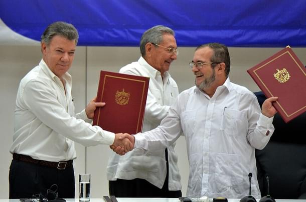 Colombia’s President Juan Manuel Santos (L) and Timoleon Jimenez. Photo
 credit: ADALBERTO ROQUE/AFP/GettyImages