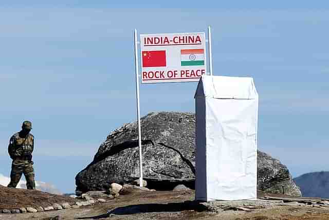 

An Indian Army soldier keeps a vigil at Bumla pass at the India-China border in Arunachal Pradesh.  Photo credit: BIJU BORO/AFP/GettyImages