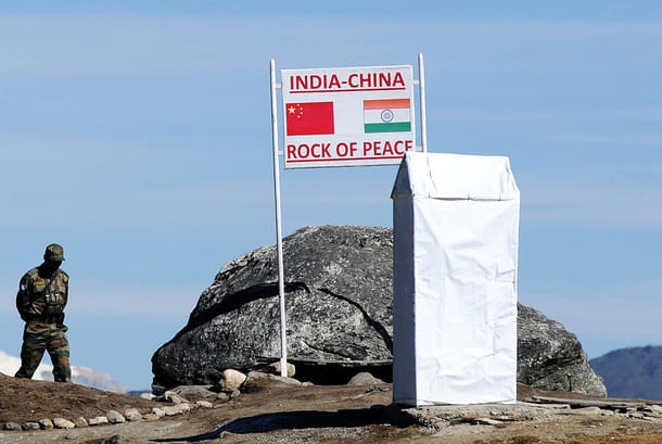 An Indian Army soldier keeps a vigil at Bumla pass at the India-China border in Arunachal Pradesh. (BIJU BORO/AFP/Getty Images)