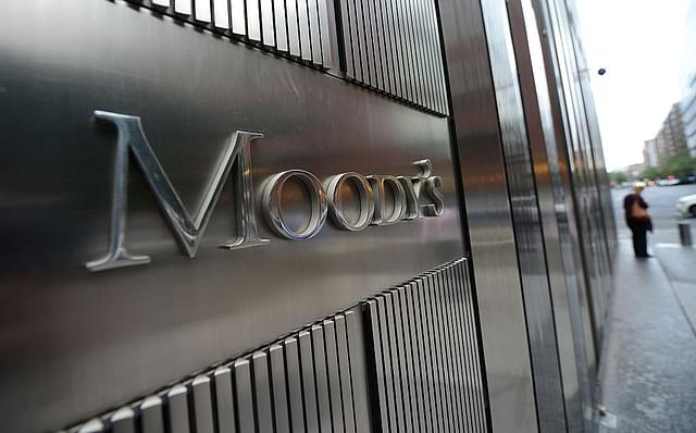A sign for Moody’s rating agency stands in front of the company headquarters in New York. (EMMANUEL DUNAND/AFP/Getty Images)
