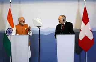 PM Narendra Modi gives a news conference with Swiss President Johann Schneider-Ammann after their meetings in Geneva, Switzerland, 6 June.