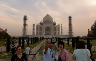 Tourists take a Selfie as they visit the Taj Mahal in Agra. (MONEY SHARMA/AFP/Getty Images)