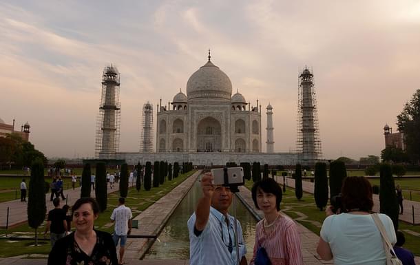 Tourists take a Selfie as they visit the Taj Mahal in Agra. (MONEY SHARMA/AFP/Getty Images)