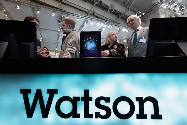 

Visitors check out a slimmed down version of the IBM Watson supercomputer. (Photo: Sean Gallup/Getty Images)