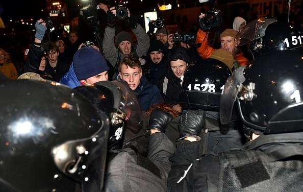 Activists of some far-right Ukrainian parties clash with
riot on Independence Square in Kiev after a rally marking the third anniversary
of the Euromaidan protests - pro-EU revolution with President Petro
Poroshenko’s firm rejection of ‘the Russian world’. (SERGEI SUPINSKY/AFP/GettyImages)      