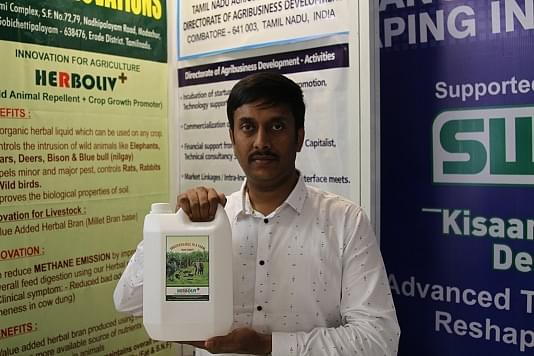 















G V
Sudarshan with his product
made of botanical extracts to repel wild animals. 

