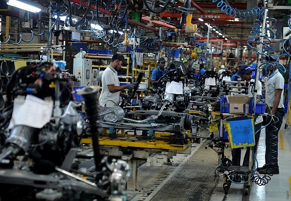 Factory workers at the
assembly lines of components for Datsun Go and Renault Kwid vehicles at Renault
Nissan Automotive India factory in Chennai.&nbsp;