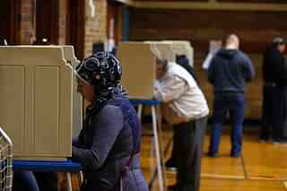 People voting in the US presidential election in Dearborn, Michigan. Photo credit: JEFF KOWALSKY/AFP/Getty Images