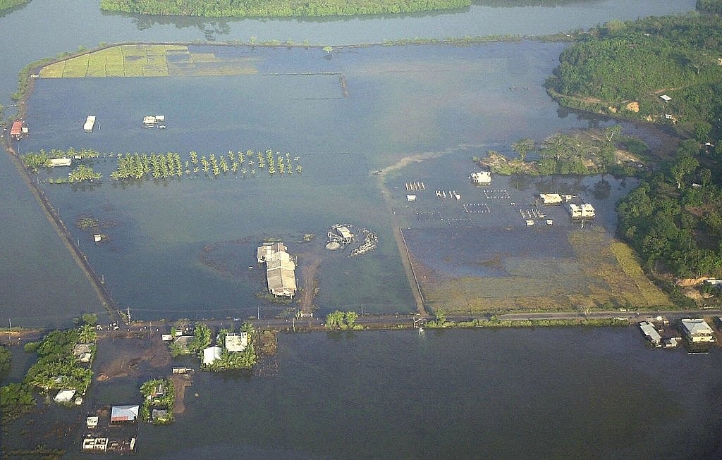
File picture: Houses and land lie under water after tidal 
waves hit Port Blair on 28 December 2004. Photo credit: DESHAKALYAN 
CHOWDHURY/AFP/GettyImages

