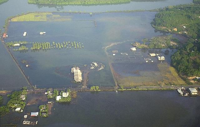 
File picture: Houses and land lie under water after tidal 
waves hit Port Blair on 28 December 2004. Photo credit: DESHAKALYAN 
CHOWDHURY/AFP/GettyImages

