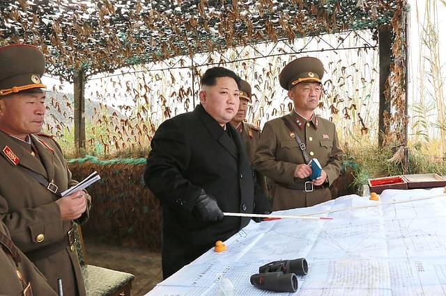 North Korean leader Kim Jong-Un (C) at the defence detachment on Mahap Islet in Ongjin County, South Hwanghae. Photo credit: KNS/AFP/Getty Images