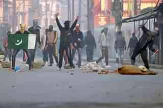 
Kashmiri protestors clash with local police in 
downtown Srinagar. (TAUSEEF MUSTAFA/AFP/Getty Images)


