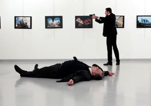 Russian Ambassador to Turkey Andrei Karlov lies 
on the ground after he was shot. (REUTERS)