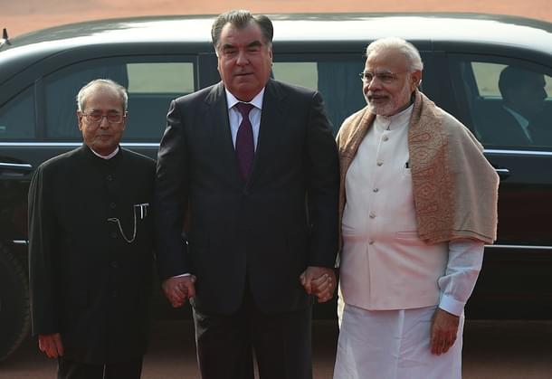 President of the Republic of Tajikistan Emomali Rahmon (C) shakes
hands with India Narendra Modi and Pranab Mukherjee (PRAKASH SINGH/AFP/Getty Images)
