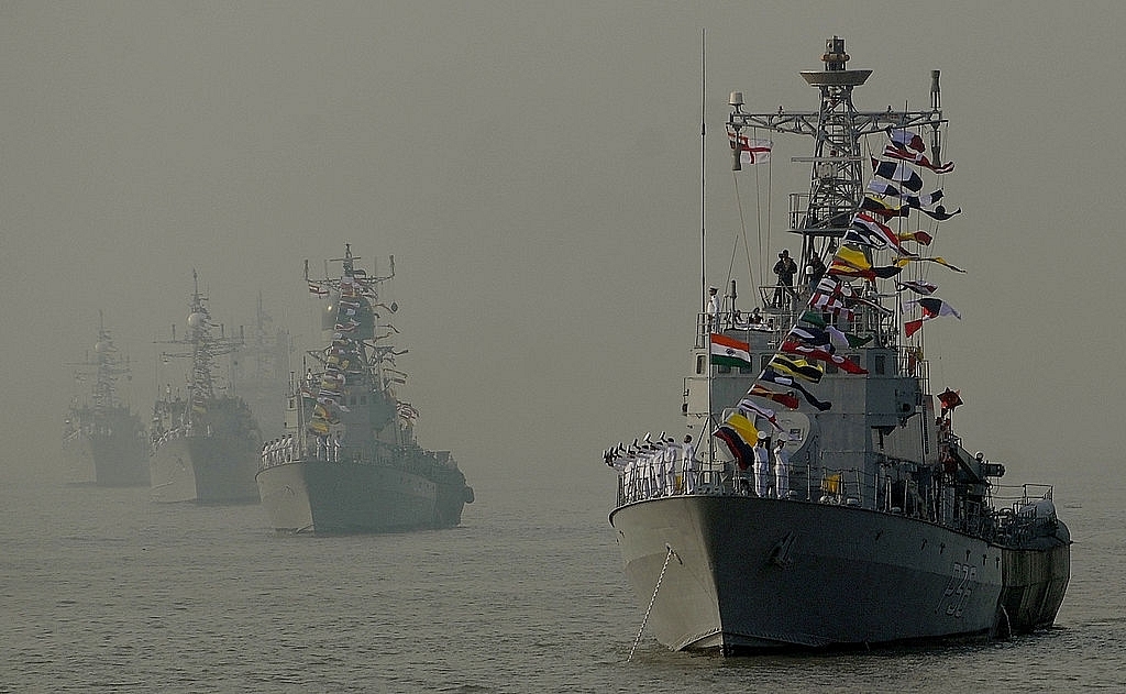 
Indian Naval ships are seen during a the Fleet Review. Photo credit: PUNIT 
PARANJPE/AFP/Getty Images

