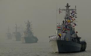 Indian Naval ships are seen during a the Fleet Review. Photo credit: PUNIT 
PARANJPE/AFP/Getty Images