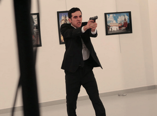 Moments after a gunman shot dead the Russian ambassador to Turkey. (Reuters)