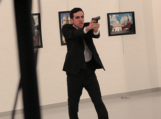 
Moments after a gunman shot dead the Russian ambassador to Turkey. (Reuters) 

