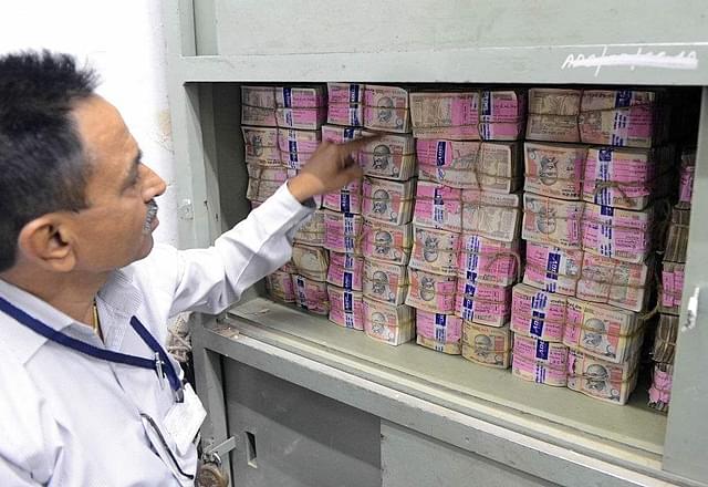 Old denomination Rs 1,000 currency notes in a bank vault in Ahmedabad (SAM PANTHAKY/AFP/Getty Images)