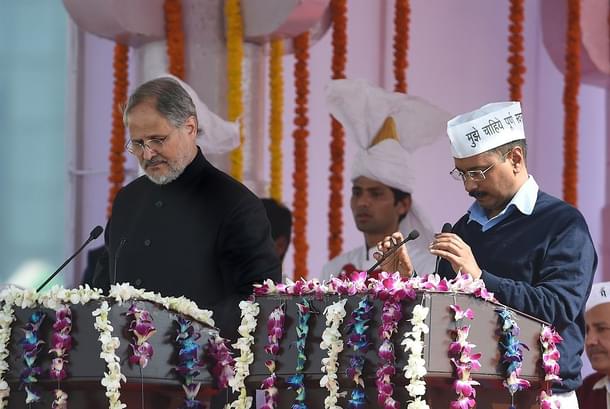 Kejriwal and Jung during the former’s swearing-in ceremony in New Delhi. (PRAKASH SINGH/AFP/GettyImages)