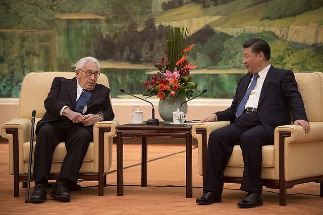 Henry Kissinger meets  Xi Jinping at the Great Halll of the People on December 2, 2016 In Beijing, China. (Photo credit: Nicolas Asouri - Pool / Getty Images)
