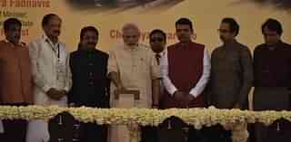 Prime Minister Narendra Modi inaugurates one of the projects. (Prime Minister’s Twitter Feed)