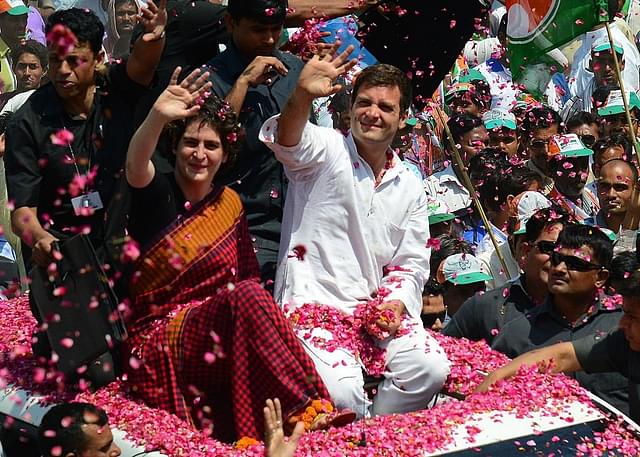  
Rahul Gandhi and Priyanka Gandhi on top of the car before Rahul filed his nomination. (Sanjay
 Kanojia/AFP/Getty Images)

