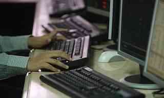 Representative image of a man using a desktop computer in India (PUNIT PARANJPE/AFP/Getty Images)
