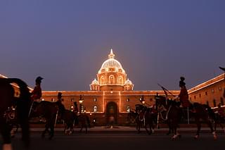 Mounted Indian Presidential Guards on horseback are pictured following the rehearsal of the Beating Retreat Ceremony at Vijay Chowk in New Delhi on 27 January 2015. (Chandan Khanna/AFP/Getty Images)