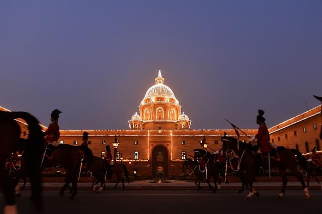 Mounted Indian Presidential Guards on horseback are pictured following the rehearsal of the Beating Retreat Ceremony at Vijay Chowk in New Delhi on 27 January 2015. (Chandan Khanna/AFP/Getty Images)