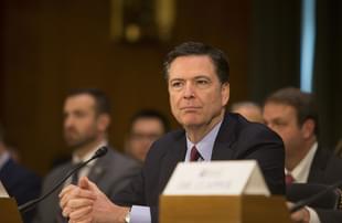 FBI Director James Comey testifies during a Senate hearing. (TASOS KATOPODIS/AFP/Getty Images)