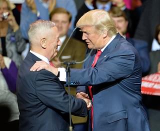 Donald Trump shakes hand with retired US Marine General James Mattis after naming him Secretary of Defense at Crown Coliseum on December 6, 2016 in Fayetteville, North Carolina. (Sara D. Davis/GettyImages)