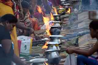 People celebrating Pongal. (Photo: INDRANIL MUKHERJEE/AFP/Getty Images)