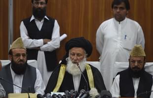 Council of Islamic Ideology (CII) chairman Maulana Muhammad Khan Sherani (C) addresses a press conference in Islamabad. (FAROOQ NAEEM/AFP/Getty Images)