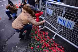 People lay flowers in front of the Reina nightclub in
Istanbul, after a gunman killed 39 people, including many foreigners, in a
rampage at an upmarket nightclub in Istanbul. (YASIN AKGUL/AFP/GettyImages) &nbsp; &nbsp; &nbsp;