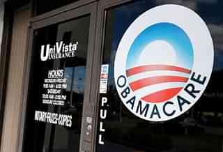 An Obamacare logo on the door of the UniVista Insurance agency in Miami, Florida in 2017 (RHONA WISE/AFP/Getty Images)