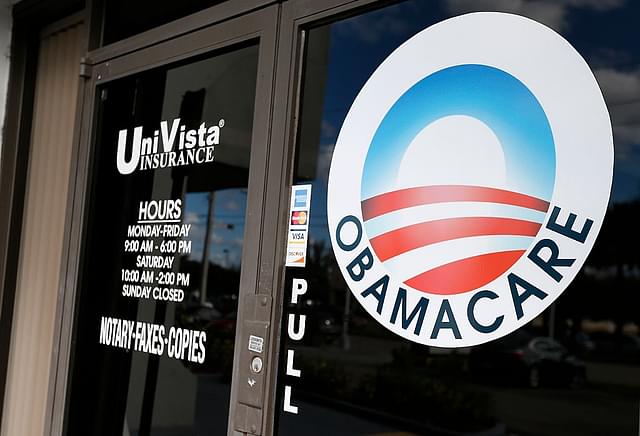 An Obamacare logo on the door of the UniVista Insurance agency in Miami, Florida in 2017 (RHONA WISE/AFP/Getty Images)