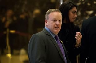 Sean Spicer walks through the lobby at Trump Tower in New
York City. (Drew Angerer/GettyImages)