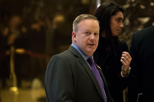 Sean Spicer walks through the lobby at Trump Tower in New
York City. (Drew Angerer/GettyImages)