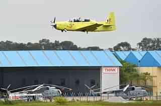 A Hindustan Turbo Trainer-40 (HTT-40) aircraft developed by
HAL takes part in a test flight in Bangalore. (MANJUNATH KIRAN/AFP/GettyImages)
