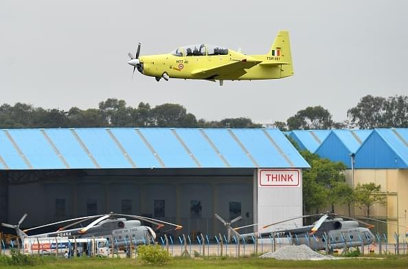 A Hindustan Turbo Trainer-40 (HTT-40) aircraft developed by
HAL takes part in a test flight in Bangalore. (MANJUNATH KIRAN/AFP/GettyImages)