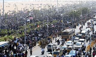 

Protesters gather during a demonstration against the ban on jallikattu and calling for a ban on animal rights orgnisation PETA, at Marina Beach in Chennai. (ARUN SANKAR/AFP/GettyImages)