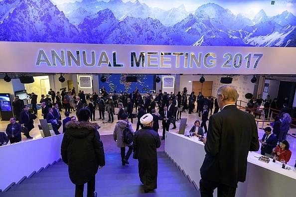 

Participants to the World Economic Forum walk down the stairs in the Congress Centre, on the opening day of the World Economic Forum, on January 17, 2017 in Davos. (FABRICE COFFRINI/AFP/GettyImages)